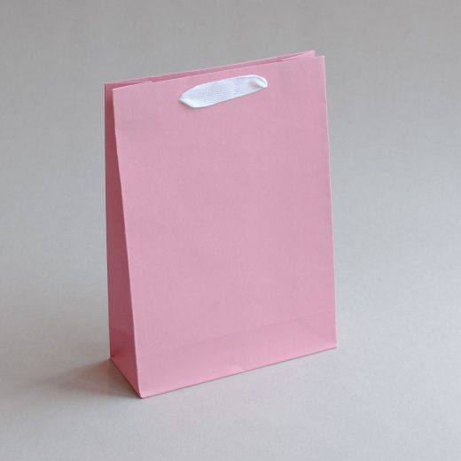 Presentpåsar i rosa och lila nyanser