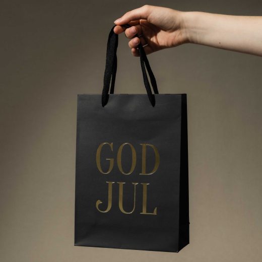 Dekorativa julklappspåsar med guldtryck